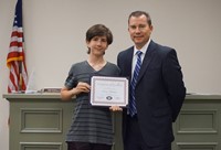 CMS Duke TIP student with superintendent