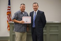 LHS baseball coach with superintendent