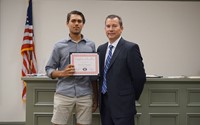 LHS baseball player with superintendent