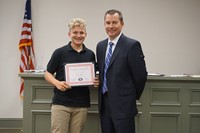 LHS baseball player with superintendent