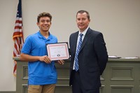 LHS baseball player with superintendent