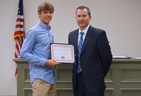 LHS baseball player with superintendent