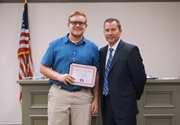 LHS baseball player with superintendent