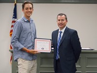 LHS baseball player with superintendent