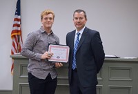 LHS baseball player with superintendent
