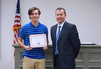 LHS baseball player with superintendent