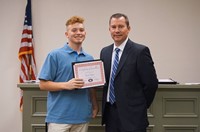 LHS baseball player with superintendent