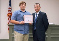 LHS baseball player with superintendent