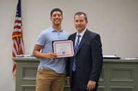 LHS baseball player with superintendent