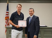 LHS baseball player with superintendent