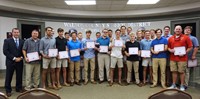 LHS baseball team with coaches and superintendent