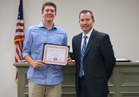 LHS baseball player with superintendent