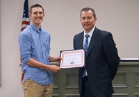 LHS baseball player with superintendent