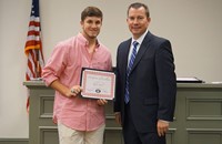 LHS baseball player with superintendent