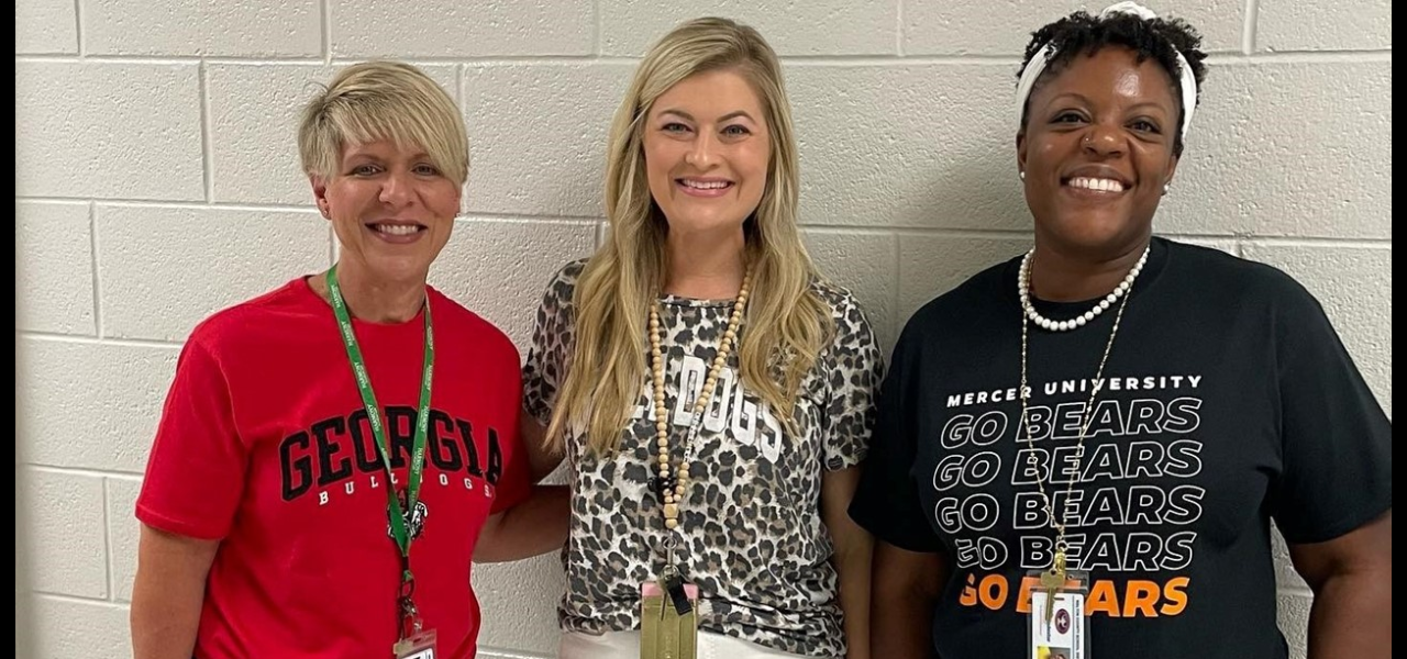 teachers with team shirts